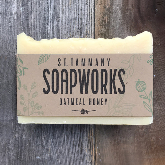 Oatmeal Honey Soap bar by St. Tammany Soapworks with kraft label on wood