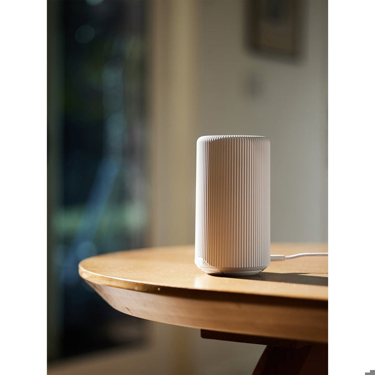 White Pura Plus on a table