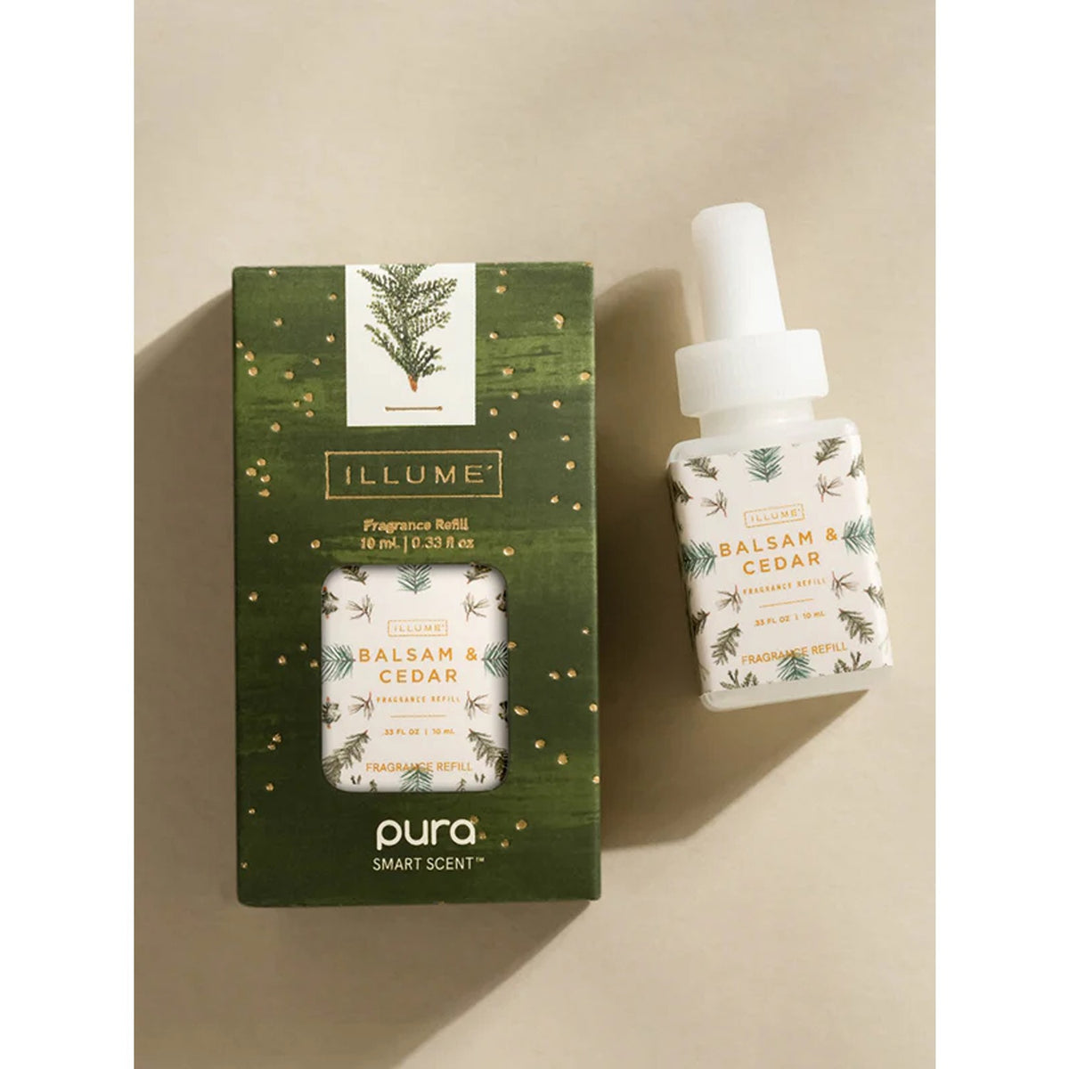 Top view of Illume Balsam & Cedar Pura smart vial lying next to its green gift box