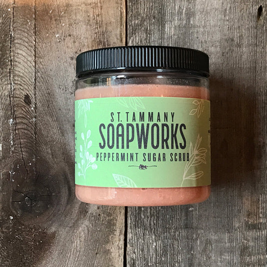 Jar of Peppermint Sugar Scrub by St. Tammany Soapworks on rustic wood