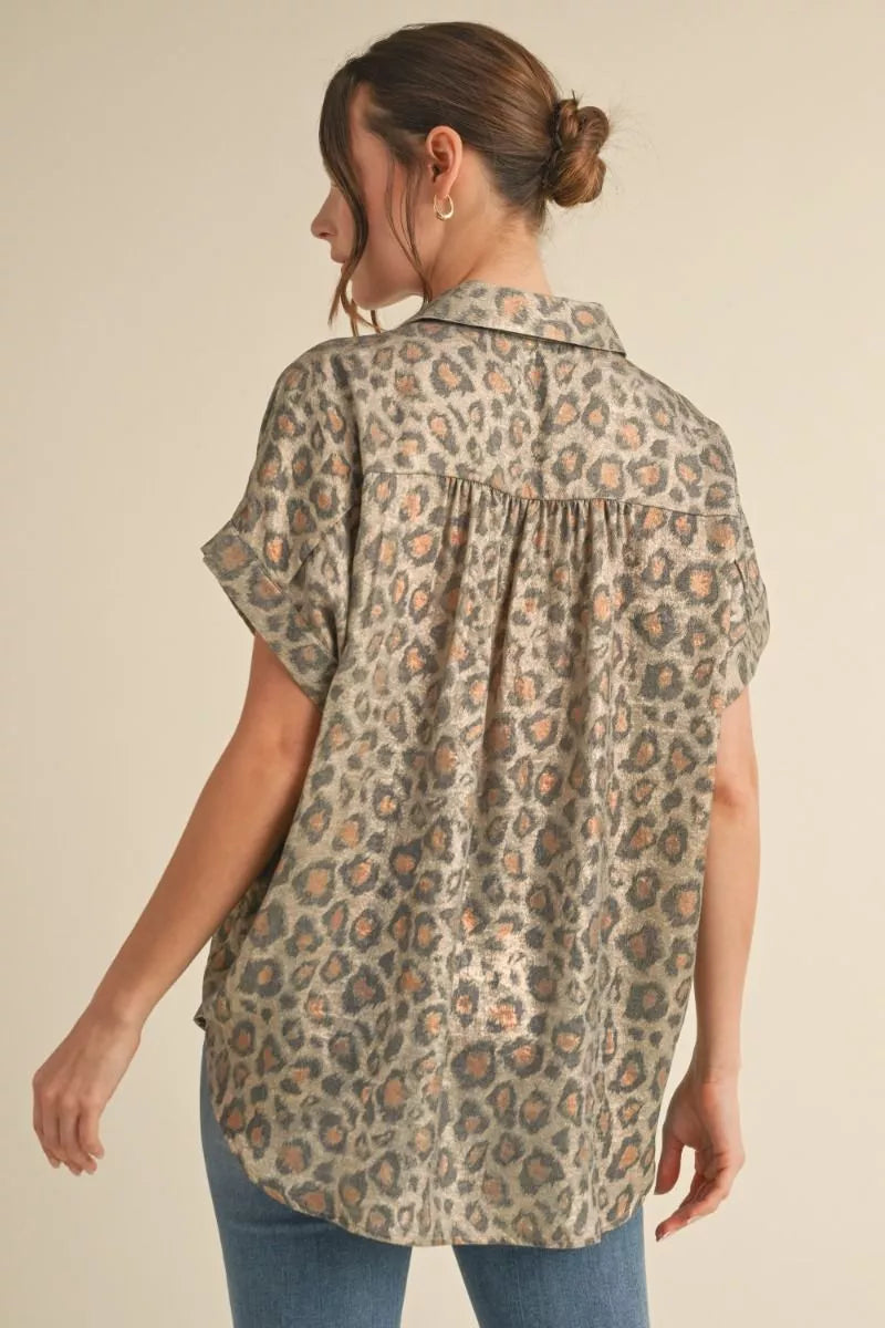 back view of a metallic shimmer leopard print oversized top 